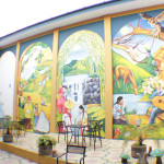 Mural in the open air area at Hotel Los Arcos.