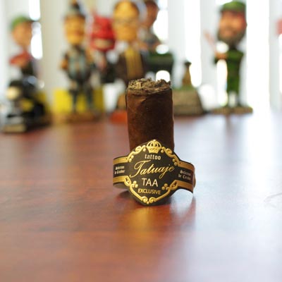 The end of a great cigar. And yes, that is my bobble head collection in the background.